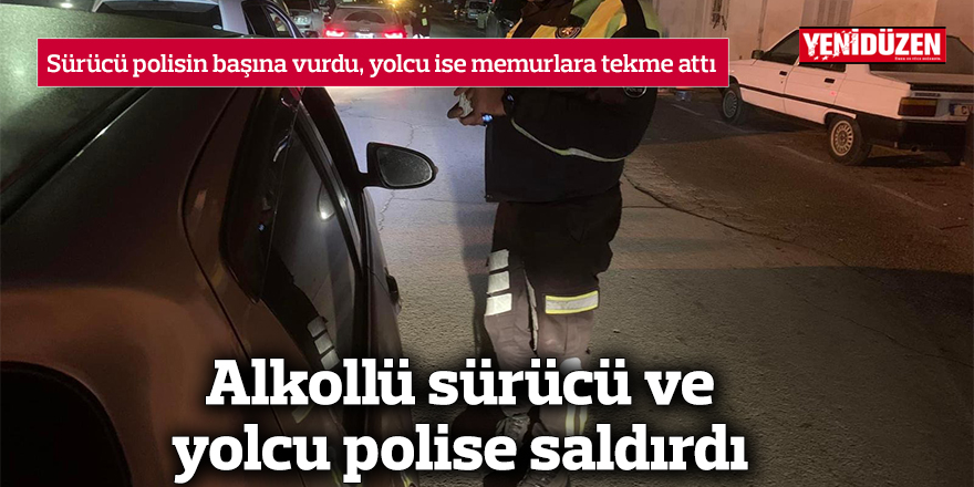 Alkollü sürücü ve yolcu polise saldırdı