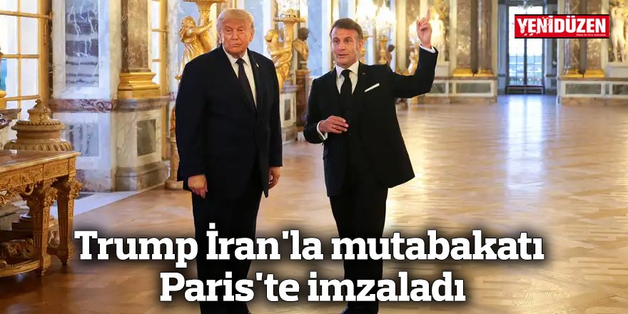 Trump İran'la mutabakatı Paris'te imzaladı