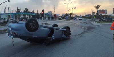 Trafik ışıklarına çarparak durabildi