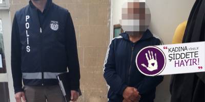 Telefonu vermediği eşini darp etti