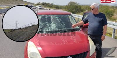 Seyir halindeki aracın üzerine elektrik teli düştü