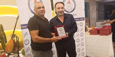 KAMUSEN, 25 yıl ve üzeri görev yapan çalışanlara plaket takdim etti