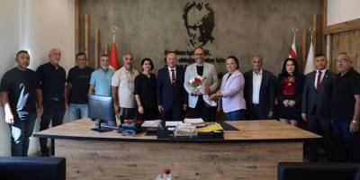 ADAK-DER heyeti, İskele Belediye Başkanı Sadıkoğlu’nu ziyaret etti