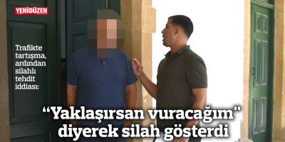 “Yaklaşırsan vuracağım" diyerek silah gösterdi