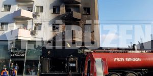 Kundaklanan binadan ceset çıktı