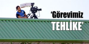 Kameramanlar çatıda çekiyor