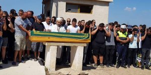 Gözyaşları içinde toprağa verildi...