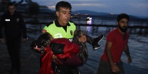 POLİS KUCAĞINDA ÇOCUKLA 100 METRE KOŞTU