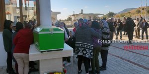 Oğlunun yanına defnedildi