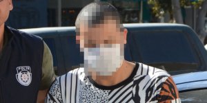 Eşini ‘öldürmekle’ tehdit etti