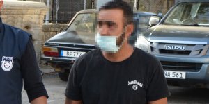 Eşini ‘öldürmekle’ tehdit etti